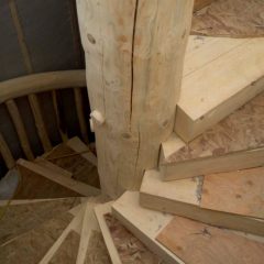 The treads join the center post perfectly | Log Spiral Stairs | Handcrafted Wood LLC