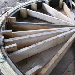 Laminating the railing that will surround the stairwell on the second floor | Log Spiral Stairs | Handcrafted Wood LLC