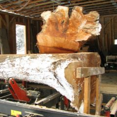 The last portion of the log must be cut by hand | Handcrafted Timber Accents | Handcrafted Wood LLC