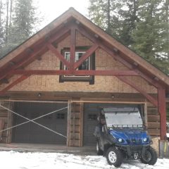 Front of garage with doors installed | Timber Frame Garage | Handcrafted Wood LLC