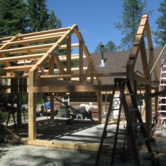 The purlins are in on over the loft portion of the garage | Handcrafted Wood LLC