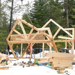 The second bent is raised | Timber Frame Home | Handcrafted Wood LLC