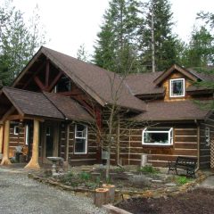 Finished home, including the front porch | Timber Frame Home | Handcrafted Wood LLC