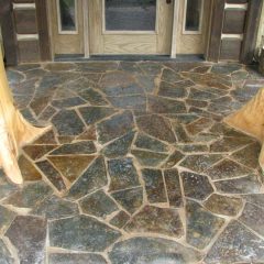 Front porch flagstone and flared cedar posts | Timber Frame Home | Handcrafted Wood LLC
