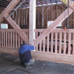 Inserting oak pegs | Timber Frame Home | Handcrafted Wood LLC