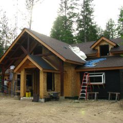 Additions are added, converting this garage into the home | Timber Frame Home | Handcrafted Wood LLC