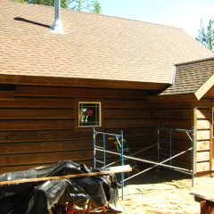 Siding is going on | Timber Frame Home | Handcrafted Wood LLC