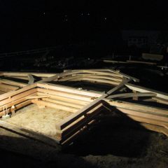 Night shot after assembling the bents on-site | Timber Frame Barn | Handcrafted Wood LLC