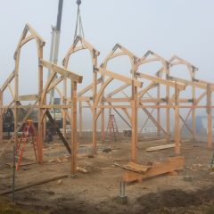 The last bent is up | Timber Frame Barn | Handcrafted Wood LLC