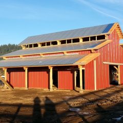 Metal installation | Timber Frame Barn | Handcrafted Wood LLC