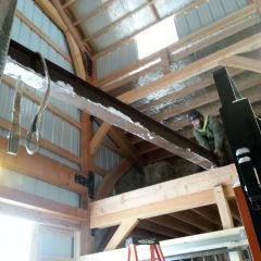 Installing the hay hoist | Timber Frame Barn | Handcrafted Wood LLC