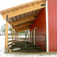 Covered paddock "wings" | Timber Frame Barn | Handcrafted Wood LLC