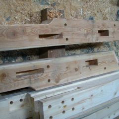 Gunstock posts with mortises and peg holes crafted in the shop | Timber Frame Hot Tub Pavilion | Handcrafted Wood LLC