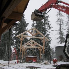 Setting the front timber frame bent | Timber Frame Hot Tub Pavilion | Handcrafted Wood LLC