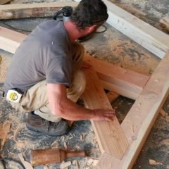 Fitting a knee brace | Custom Timber Frame Miniature Horse Barn | Handcrafted Wood LLC
