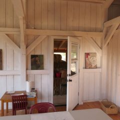 Side door | Barn with interior art studio space | Custom Timber Frame Miniature Horse Barn | Handcrafted Wood LLC